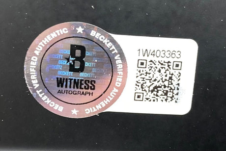 The Alvin Kamara Signed NO Saints FS Eclipse Replica Speed Helmet by Sports Integrity features a Beckett Witness Autograph sticker with a large B, QR code, and serial number 1W403363 on a white rectangular background.