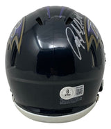 A Sports Integrity Baltimore Ravens mini speed helmet, signed by Anquan Boldin in silver, features BAS authentication and autographs on the top and sides.