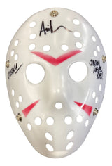The Ari Lehman Signed Jason Voorhees White Costume Mask by Sports Integrity features red markings, multiple ventilation holes, metal rivets, black signatures, and "JASON NEVER DIES!" written on it.