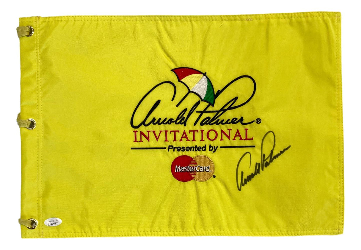 The Sports Integrity Arnold Palmer Signed Arnold Palmer Invitational Yellow Golf Flag features the event logo, colorful umbrella, MasterCard branding, metal eyelets on the left side, and comes with a JSA LOA.