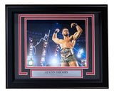 The Sports Integrity Austin Theory Signed Framed 8x10 WWE Photo by Fanatics features the WWE Superstar posing with a championship belt, complete with autograph and labeled beneath the image.