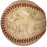 A vintage Sports Integrity Official National League baseball signed by Babe Ruth, Cobb, Wagner & more, with red stitching and faded, partially illegible autographs in black ink; authenticated by PSA+BAS.