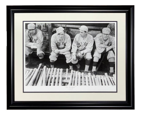The Sports Integrity Babe Ruth Boston Red Sox Framed The Dugout Historical Archive Giclee features a black and white photo of four vintage baseball players on a bench with bats, framed in black with a white mat.