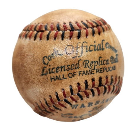 A vintage-style Babe Ruth New York Yankees replica baseball by Sports Integrity, featuring red and black stitching, a 1930s facsimile autograph, and faded "Official Licensed Replica Ball - Hall of Fame Replicas" text.
