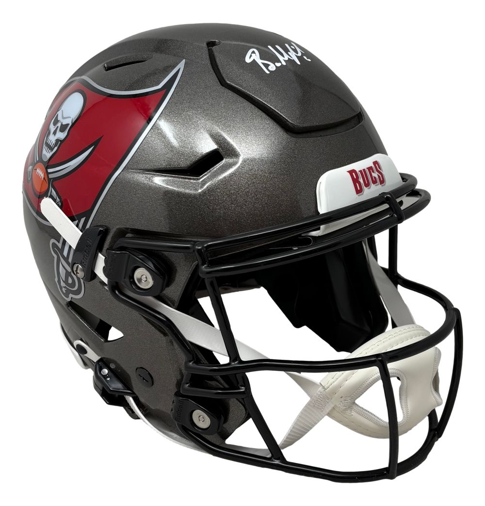 The Baker Mayfield Signed Tampa Bay Buccaneers FS Authentic SpeedFlex Helmet by Sports Integrity features a black shell, team logo, white facemask, and Baker Mayfield’s autograph in white on top.