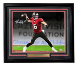 Sports Integrity Baker Mayfield Signed Framed 16x20 Buccaneers Spotlight Red Jersey Photo (BAS)—features the QB mid-throw in a red #6 jersey, with an autograph and plaque.