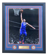 Sports Integrity Ben Simmons Framed 16x20 Philadelphia 76ers photo features him in a blue No. 25 jersey leaping for a layup, with a laser-engraved signature, gold nameplate, and two 76ers logos displayed underneath.