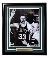 Sports Integrity Larry Bird Signed Framed 16x20 Boston Celtics Photo features Bird (#33) with Red Auerbach, posing with two fingers and a cigar. Includes green autograph and PSA/DNA authentication.