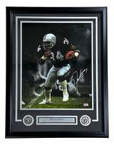 Sports Integrity Bo Jackson Signed Framed 16x20 Oakland Raiders Black Jersey Photo BAS features Bo Jackson in a black and white #34 uniform, running with the ball, with two Raiders logos and a nameplate in the frame.