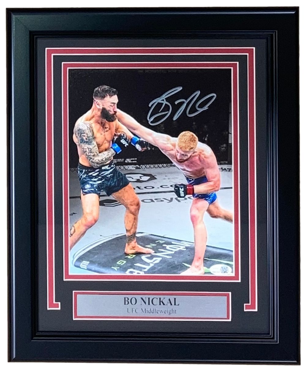 Sports Integrity Bo Nickal Signed Framed 8x10 UFC Punch Photo—features Bo Nickal in action, autographed, with a silver plaque and JSA ITP authentication.