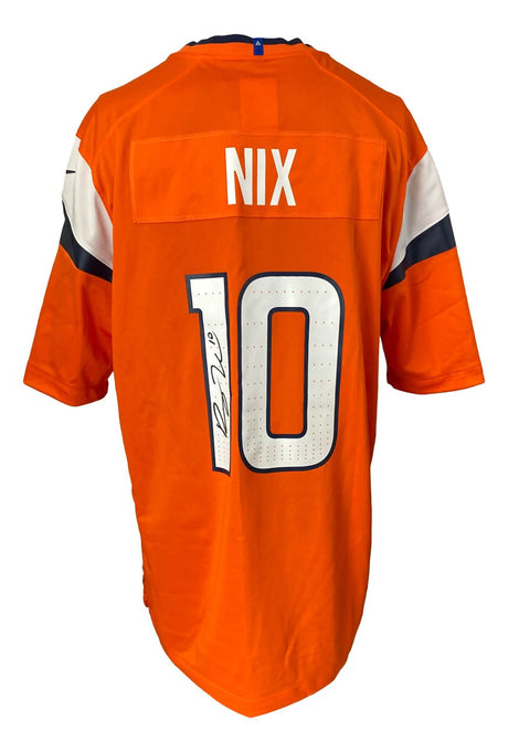The Sports Integrity Bo Nix Signed Denver Broncos Orange Nike Game Replica Jersey features NIX and number 10 on the back with a black signature, plus white and navy sleeve accents.