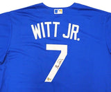 The Sports Integrity Bobby Witt Jr Signed Kansas City Royals Blue Nike Replica Jersey (BAS ITP) features "WITT JR." and a white number 7 on the back with a small autograph on the number and an MLB logo at the top.