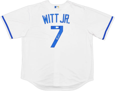 The Sports Integrity Bobby Witt Jr Signed Kansas City Royals White Nike Replica Jersey features blue trim, "WITT JR." and number 7 in blue on the back, with a signature on the number.