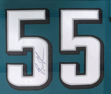 A green Brandon Graham SB 59 Champ Philadelphia football jersey by Sports Integrity, featuring large white #55 outlined in black and signed in blue ink on the left number, comes framed with JSA authentication.