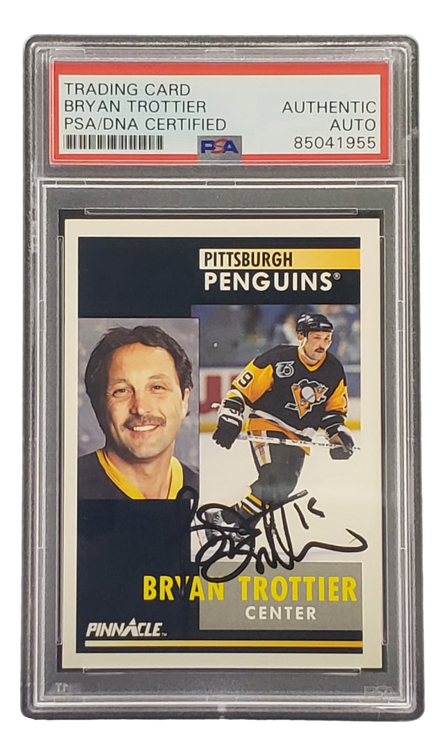 The Sports Integrity Bryan Trottier Signed 1991 Pinnacle #241 Pittsburgh Penguins Hockey Card is PSA/DNA certified authentic and features his signature across the front.