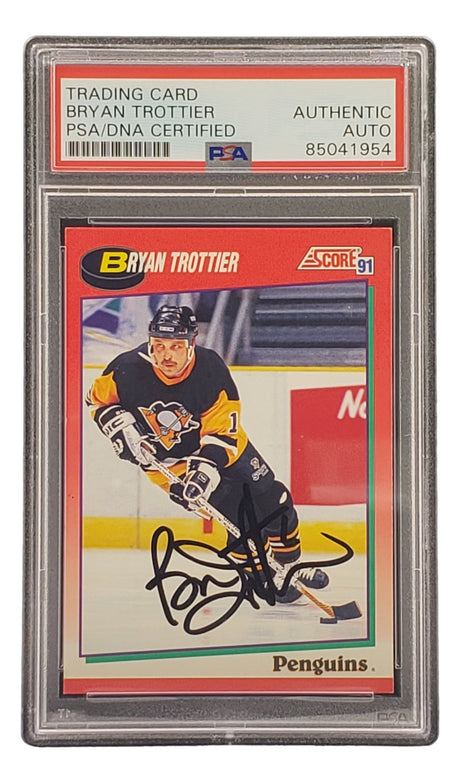 The Sports Integrity Bryan Trottier Signed 1991 Score #229 Penguins card is PSA/DNA authenticated as “AUTHENTIC AUTO” and features Trottier in his uniform, skating on the ice.