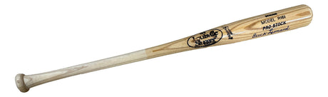A tan Buck Leonard Homestead Grays Louisville Slugger bat by Sports Integrity features signatures and model details on the barrel, with a natural wood finish and a slightly darker handle. Authenticated by JSA.