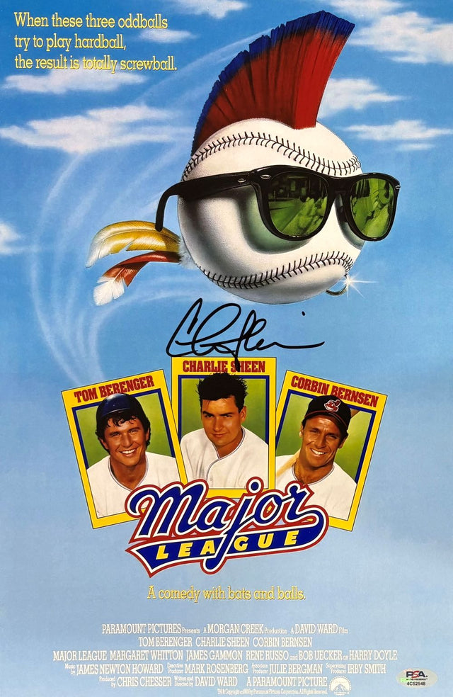Charlie Sheen Signed 11x17 Major League Photo by Sports Integrity features a baseball with sunglasses and mohawk, portraits of Tom Berenger, Charlie Sheen, Corbin Bernsen, and the tagline "A comedy with bats and balls." Includes PSA/DNA Hologram.