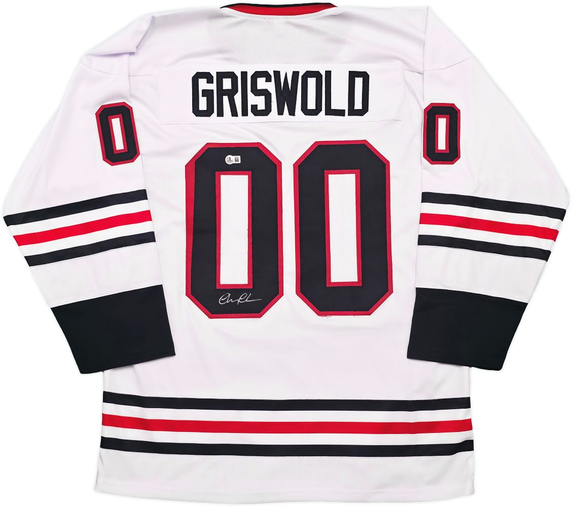 Sports Integrity Chevy Chase Signed Lampoon’s Christmas Vacation Griswold white jersey with black/red stripes, name and number 00 on back, BAS authenticated signature on one zero.