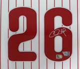The Chase Utley Signed Framed Philadelphia Phillies Nike Limited Jersey by Sports Integrity features red vertical pinstripes, a large red number 26, Utley's autograph in white marker on the number 6, and two authentication stickers below.