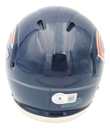 A Chevy Chase signed Chicago Bears mini speed helmet by Sports Integrity, shown from the back with ventilation slots, partial team logos on each side, and a BAS authentication sticker near the bottom.