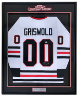 The Sports Integrity Chevy Chase Signed Framed Lampoon’s Christmas Vacation White Griswold Jersey (JSA) features GRISWOLD and 00 in black, a Chevy Chase nameplate, autograph, and display referencing the film.