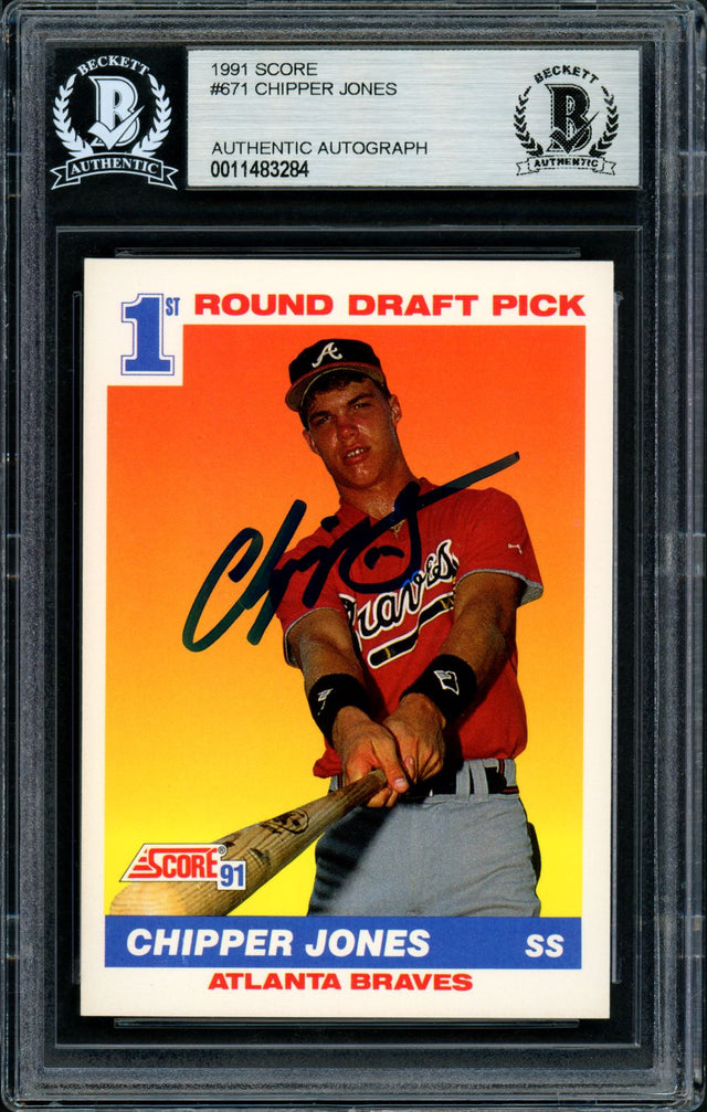 Chipper Jones Signed 1991 Score #671 Atlanta Braves Rookie Card by Sports Integrity, authenticated and slabbed by BAS.