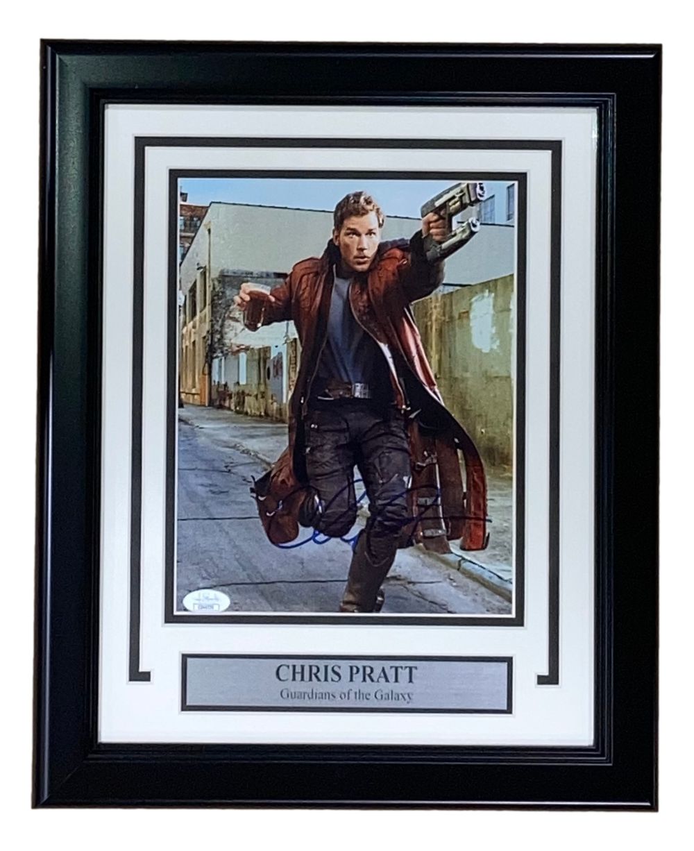 This Sports Integrity Chris Pratt Signed Framed 8x10 Running Photo from Guardians of the Galaxy features double matting and a black frame, authenticated by JSA.