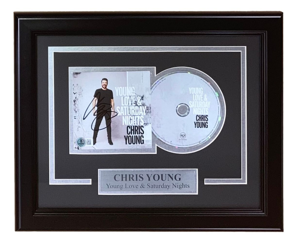 Sports Integrity presents a Chris Young Signed Framed Young Love & Saturday Nights CD Booklet (BAS), featuring a signed album cover, CD, and nameplate reading "CHRIS YOUNG Young Love & Saturday Nights.