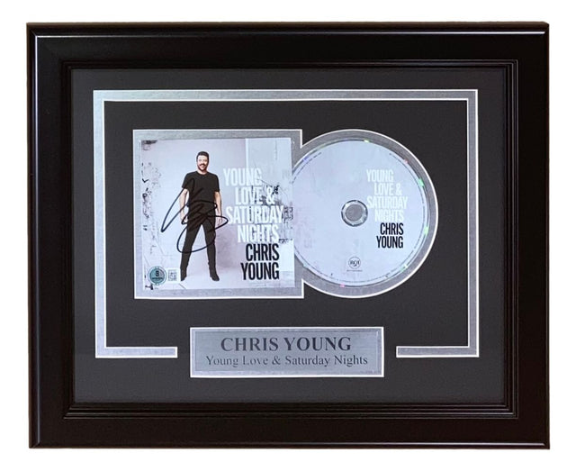 Sports Integrity presents a Chris Young Signed Framed Young Love & Saturday Nights CD Booklet (BAS), featuring a signed album cover, CD, and nameplate reading "CHRIS YOUNG Young Love & Saturday Nights.