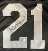 Cliff Branch Oakland Signed Black Football Jersey by Sports Integrity features a large white 21, autograph, and BAS authentication sticker on the lower part of the number 2.