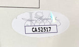 The Sports Integrity Bill Clinton Signed In Blue 5x8 Impeachment Letter features an oval sticker with faint JSA letters, a hologram, a signature, and bold black alphanumeric code CA52517 in a white rectangle at the center.