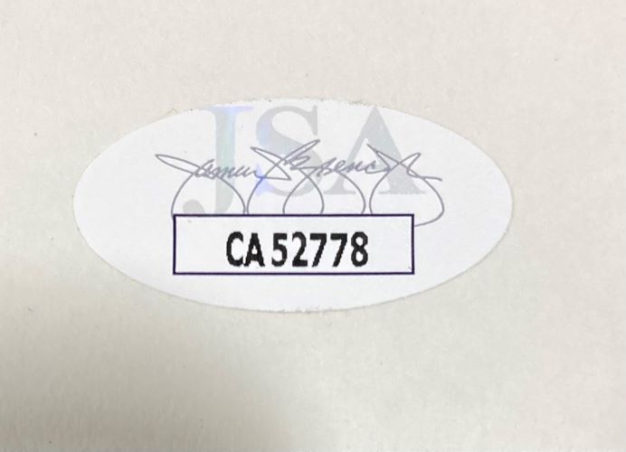 A Bill Clinton signed 5x6 Mock White House Statement Letter from Sports Integrity features an oval white JSA sticker with a cursive signature above and the bold code CA52778 centered in a rectangle.