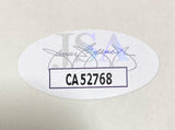 A Bill Clinton Signed Mock White House Letter (6x6) from Sports Integrity features a JSA oval sticker with a signature, bold code CA52768 in a box at the center, placed on a plain light surface.
