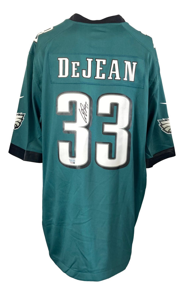 A green Philadelphia Eagles Nike Game Jersey by Sports Integrity featuring Cooper DeJean’s name and signed number 33 in black ink, with the Eagles logo on both sleeves.