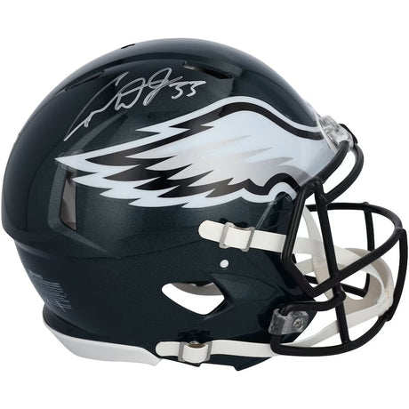 The Cooper DeJean Signed Eagles Super Bowl 59 LIX FS Replica Speed Helmet by Sports Integrity features a black faceguard, the team's white wing logo, and DeJean’s visible silver autograph on top.