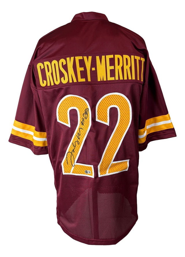 The Sports Integrity Jacory Croskey-Merritt Washington Signed Burgundy Football Jersey features his name above the number 22, with an autograph visible on one of the digits.