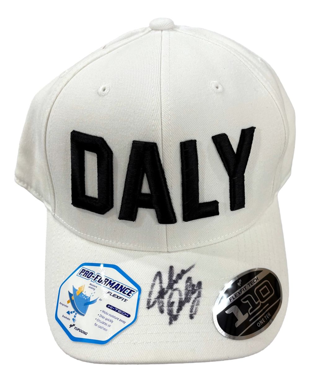 The Sports Integrity John Daly Signed White Daly Adjustable Hat features "DALY" in bold black letters, two stickers, and John Daly's black marker signature on the brim. PSA/DNA authenticated.
