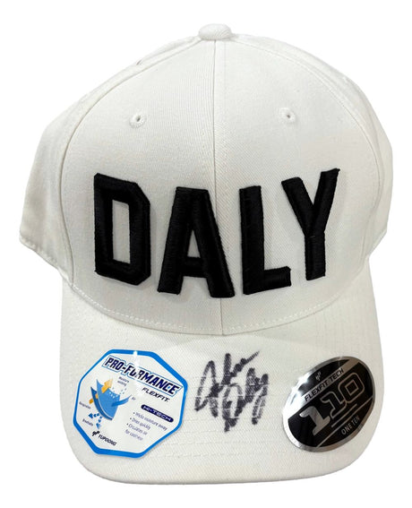 The Sports Integrity John Daly Signed White Daly Adjustable Hat features "DALY" in bold black letters, two stickers, and John Daly's black marker signature on the brim. PSA/DNA authenticated.