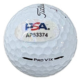 A John Daly Signed Titleist Golf Ball by Sports Integrity, featuring a PSA/DNA authentication sticker labeled AP53374.