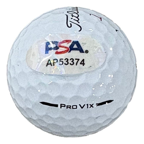 A John Daly Signed Titleist Golf Ball by Sports Integrity, featuring a PSA/DNA authentication sticker labeled AP53374.