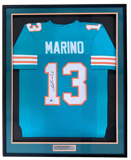 Sports Integrity Dan Marino Miami signed framed custom teal football jersey (BAS), featuring his autograph on the number and a plaque that reads Dan Marino.