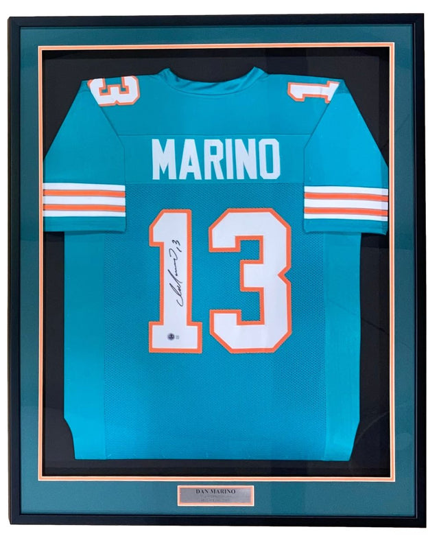 Sports Integrity Dan Marino Miami signed framed custom teal football jersey (BAS), featuring his autograph on the number and a plaque that reads Dan Marino.