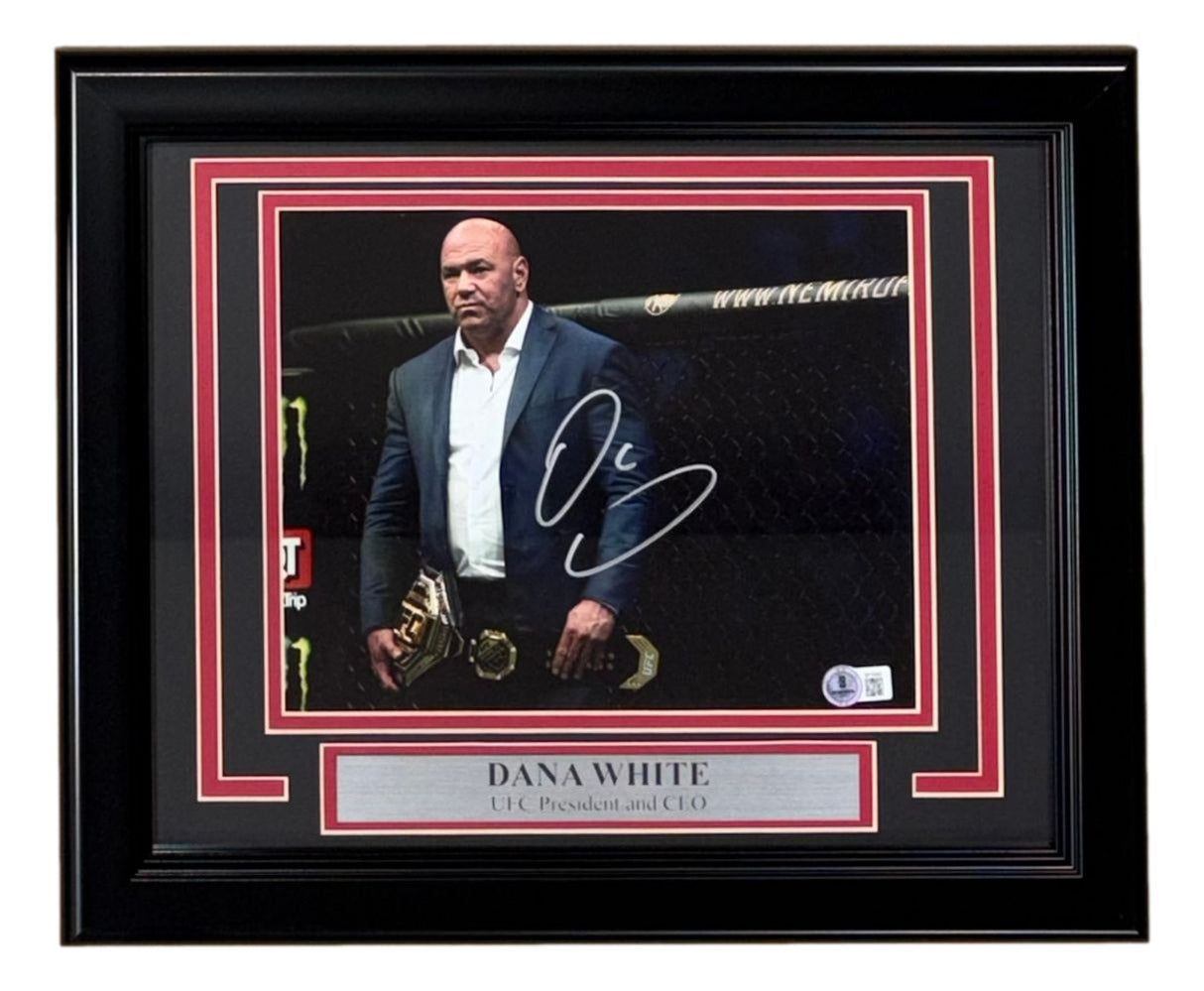 Sports Integrity Dana White Signed Framed 8x10 UFC Photo BAS features Dana White beside a UFC title in the octagon, his autograph on the photo, and a plaque with his name and title as UFC President & CEO.