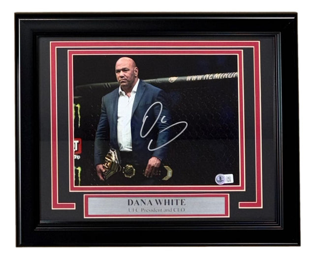 Sports Integrity Dana White Signed Framed 8x10 UFC Photo BAS features Dana White beside a UFC title in the octagon, his autograph on the photo, and a plaque with his name and title as UFC President & CEO.