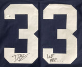 The Sports Integrity Dani Dennis-Sutton Penn State signed blue football jersey features large white number 33, with his signature on the left and "WE ARE..." handwritten on the right. Authenticated by JSA QR Holo.