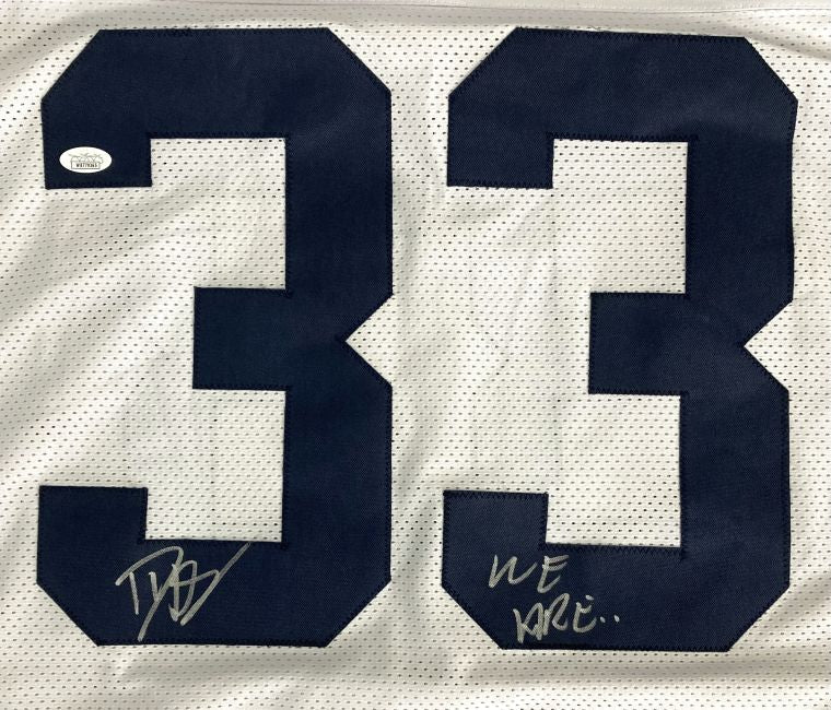 The Dani Dennis-Sutton Penn State Signed White Football Jersey by Sports Integrity features large blue number 33, two signatures (one on each "3"), and a JSA certification sticker on the top left.