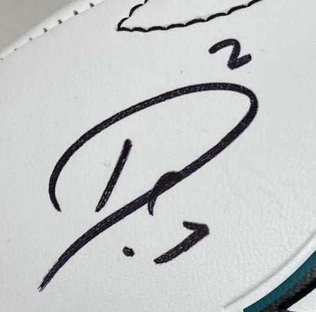 A close-up of a Sports Integrity Darius Slay Signed Philadelphia Eagles Logo Football, featuring his bold autograph with the number 2 above it, displayed in a Super Bowl 59 case.