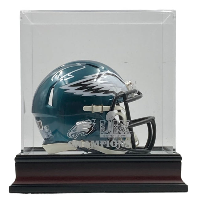 A Darius Slay signed Philadelphia Eagles mini helmet is showcased in a Sports Integrity case with a black base, featuring the Eagles logo and Super Bowl LIX Champions text on the front.