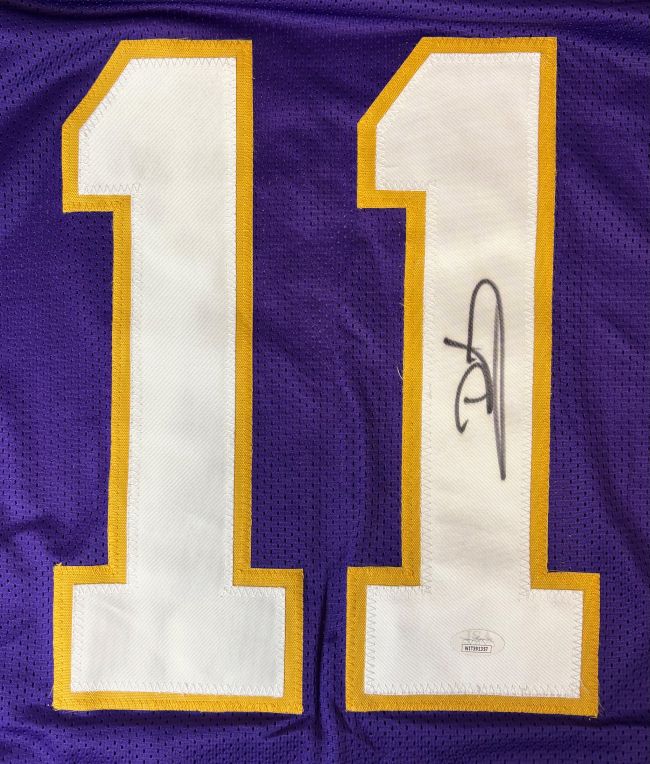 The Daunte Culpepper Minnesota Purple Football Jersey by Sports Integrity features number 11 outlined in gold and white, with his black autograph on the right "1" and a JSA authentication sticker below.